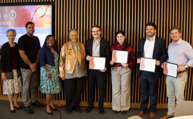 Winners of the UTHealth Houston T1-T4 in 3 Trey Waldrop, Sarah Ghalayini, Jacob Mattia, and Antonio Pagán shown standing with judges.